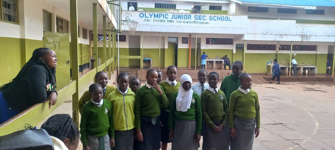 Period Pride Kenya educator conducting menstrual health session with students at Olympic Junior Secondary School